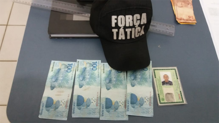 Homem é preso comprando roupas com notas falsas em Altos